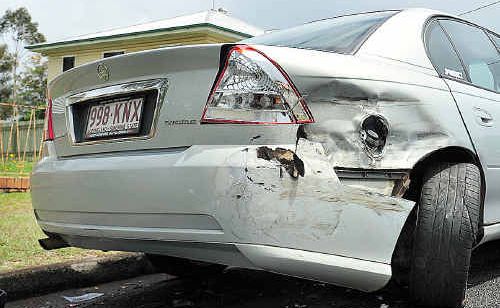 Damaged vehicle in Kent Street, Maryborough, after being hit by a speeding car. Damaged vehicle in Kent Street, Maryborough, after being hit by a speeding car.